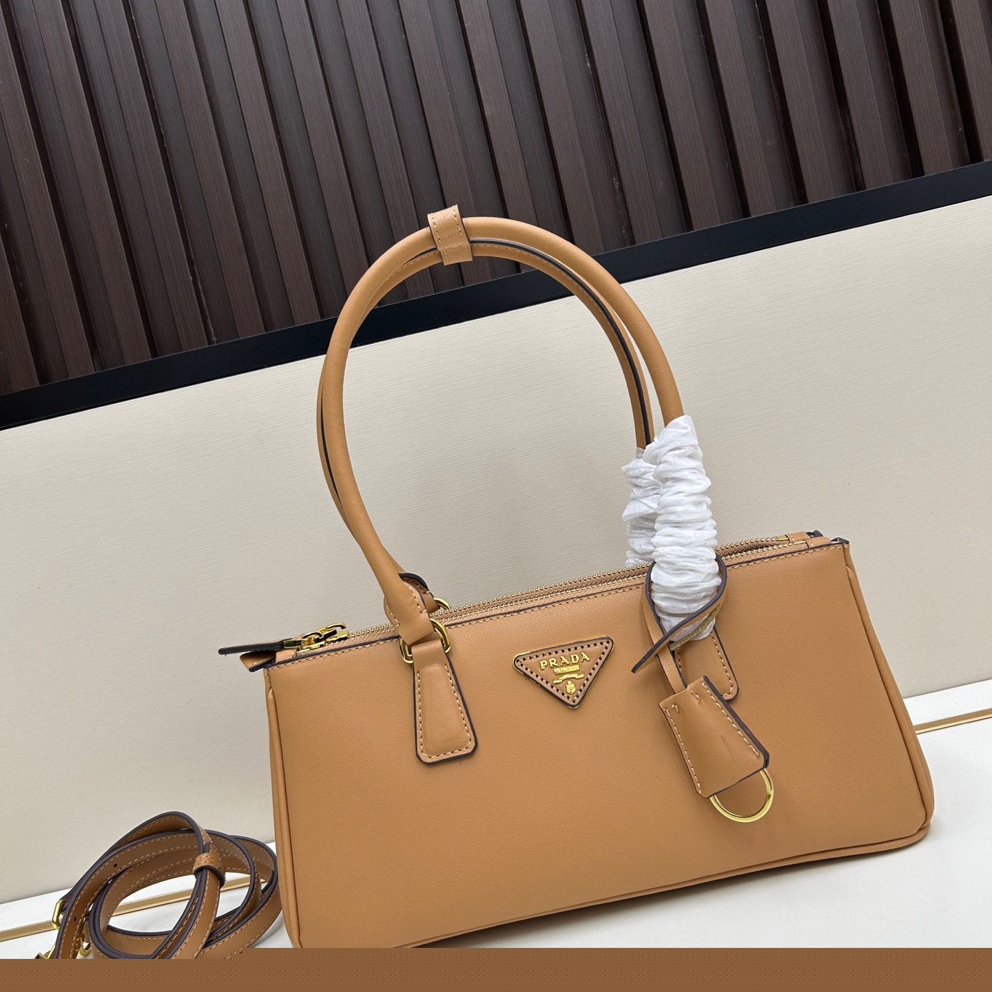Pra*a top handle bags